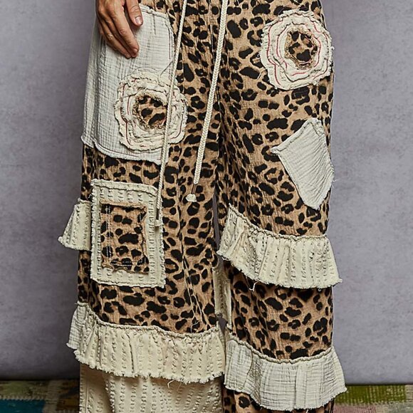 The Shirley -textured twill contrast animal print and a soft ruffle accent - Picture 1 of 5